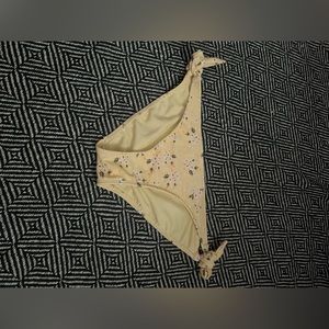 Pastel yellow floral swimsuit bottoms